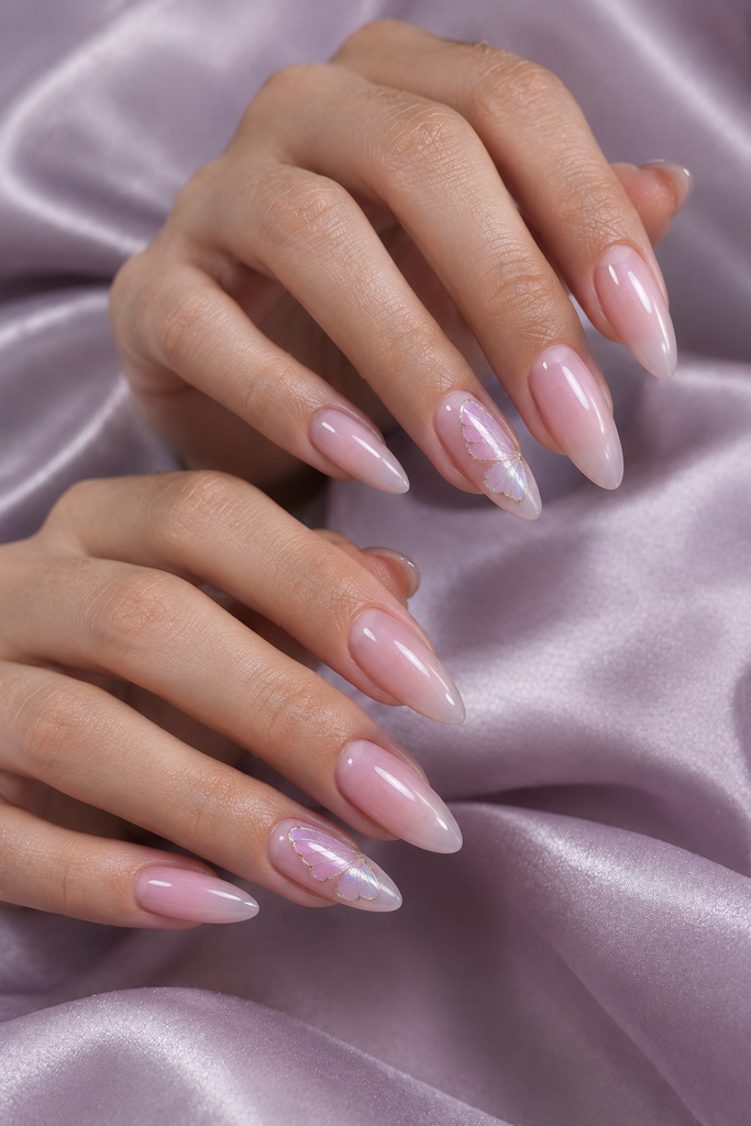 Long pink almond nails with delicate iridescent butterfly-wing accents